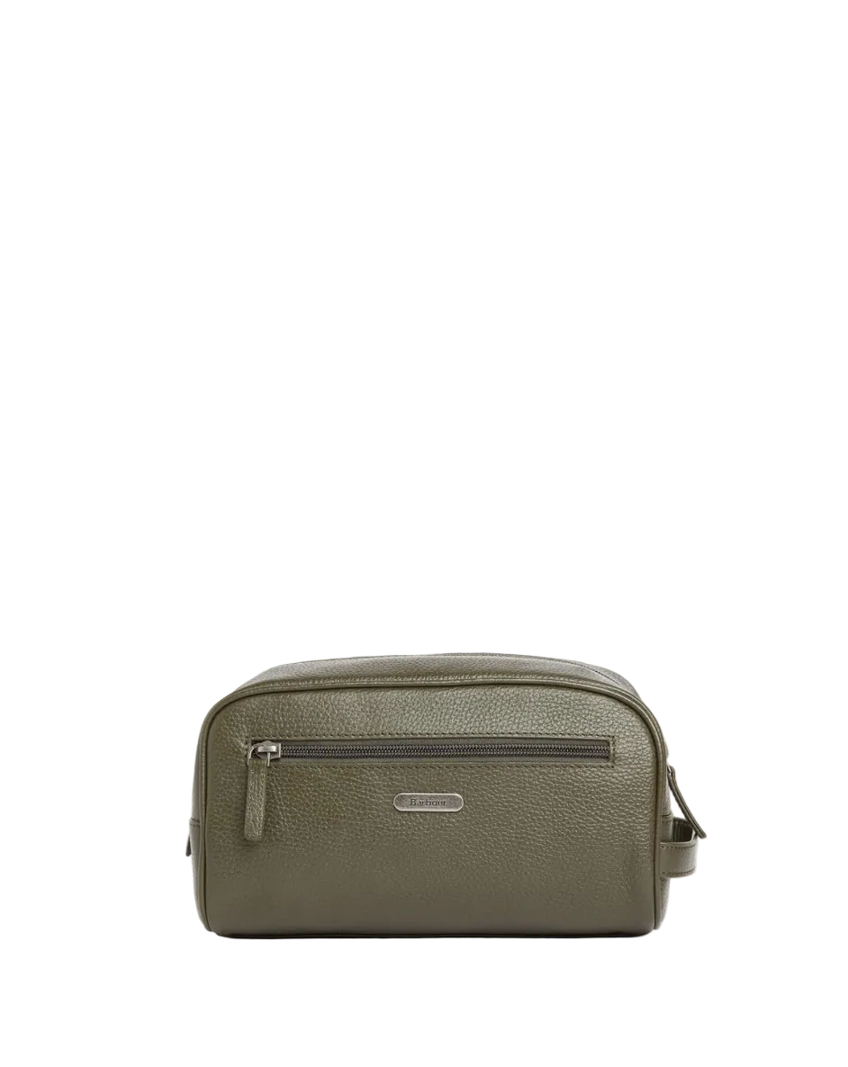 An olive green pebbled leather toiletry bag with a horizontal zippered pocket and a small silver-tone brand plaque, shown against a plain white background.