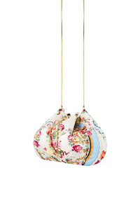 Floral patterned handbag with a chain strap on a white background