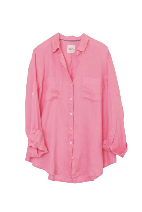 A pink long-sleeve button-up shirt with two chest pockets, shown flat against a light gray background.