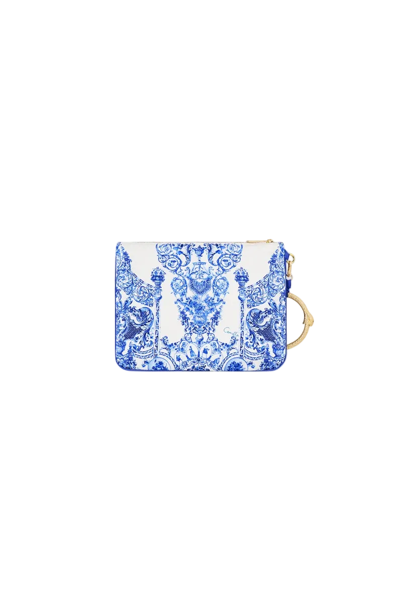 A small zip pouch with a blue and white damask pattern, featuring a gold-tone metal ring detail on the side, shown against a light gray background with an 'ON SALE' label in the top right corner.