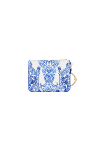A small zip pouch with a blue and white damask pattern, featuring a gold-tone metal ring detail on the side, shown against a light gray background with an 'ON SALE' label in the top right corner.